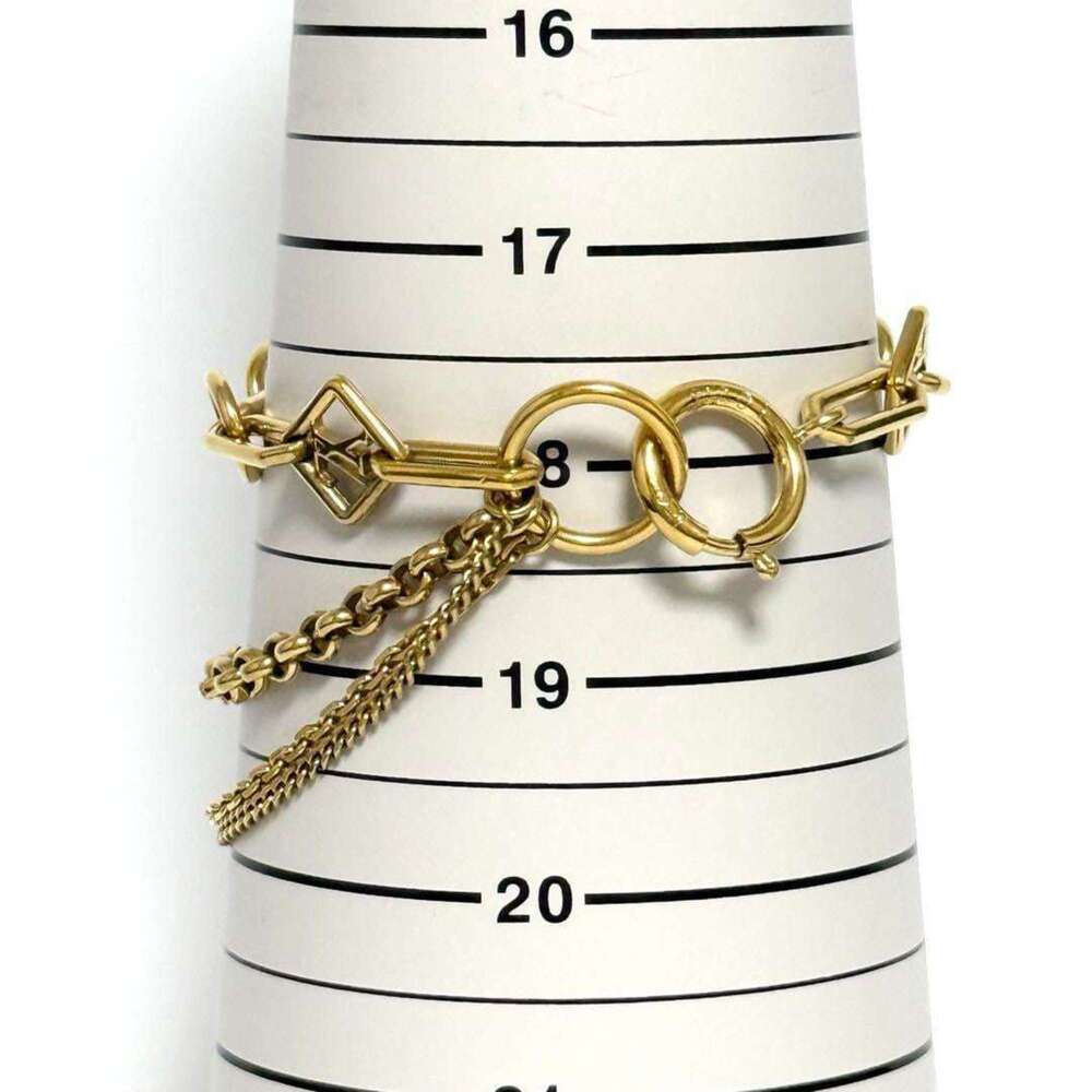 LOUIS VUITTON Gold Charm Bracelet - Picture 8 of 10